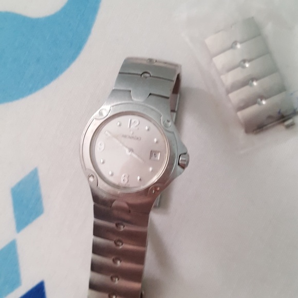Movado Accessories - Movado womans watch with extra links